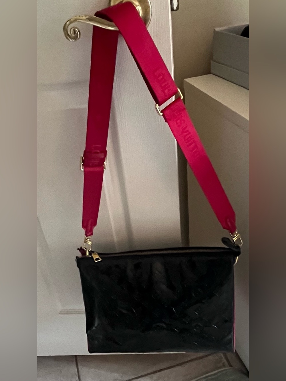 Iconic Black & Red Patent leather Monagram bag with logo strap.